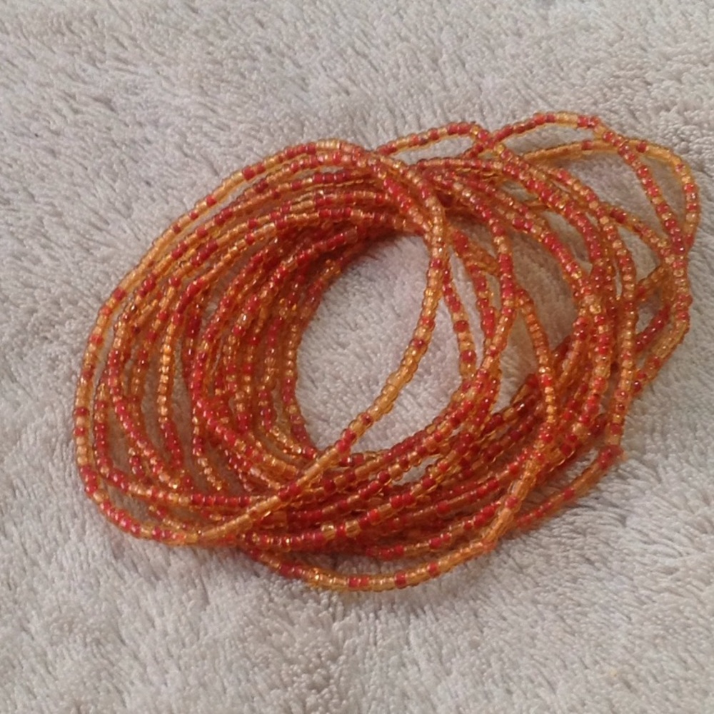 Stack of seed bead bracelets